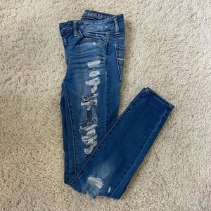 American eagle super super stretch/ ripped jeans